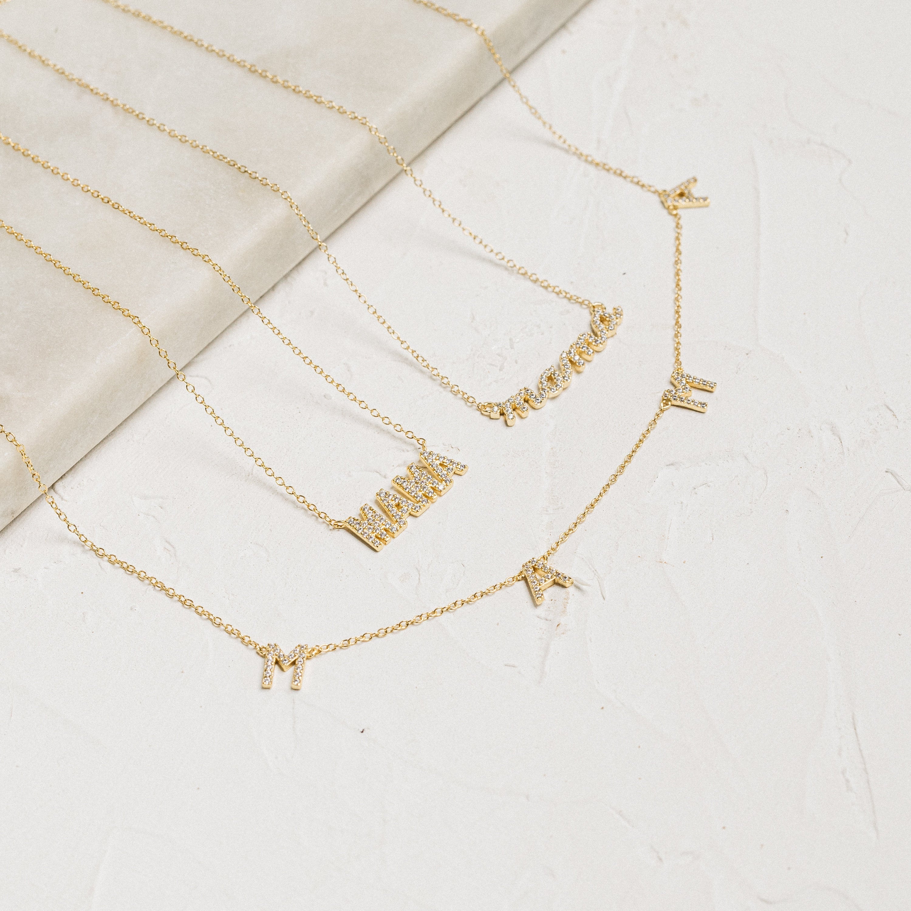 Gold pave Mama script necklace
